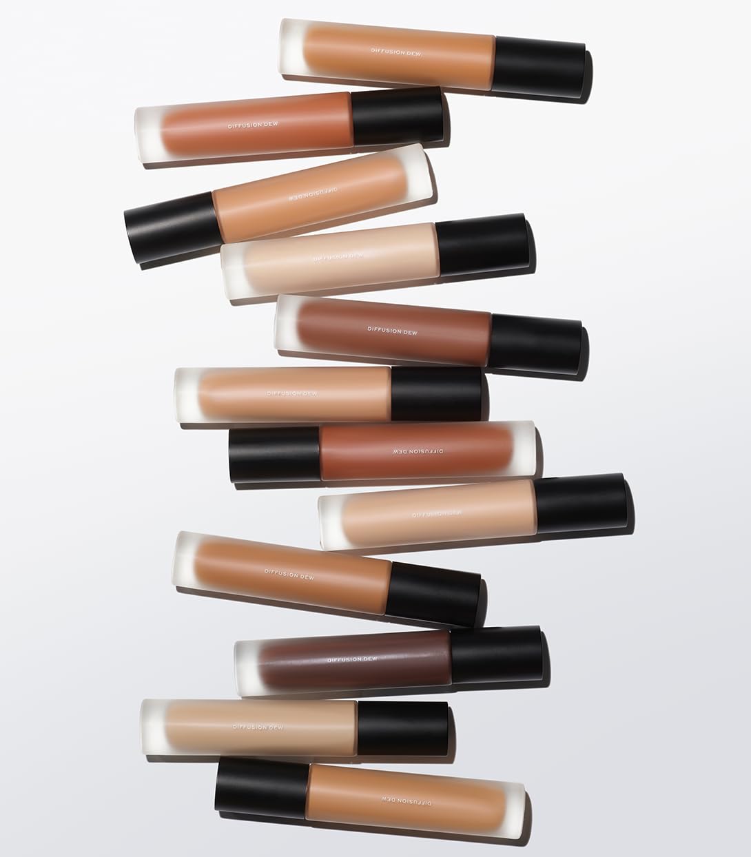 MAKE Beauty Diffusion Dew Skin Tint. Sheer to Medium Coverage Radiant Finish. Blurring, Smoothing, and Brightening for Glowing Complexion. Enhanced with Niacinamide and Adenosine. Tan 06 MAKE buy supplements canada