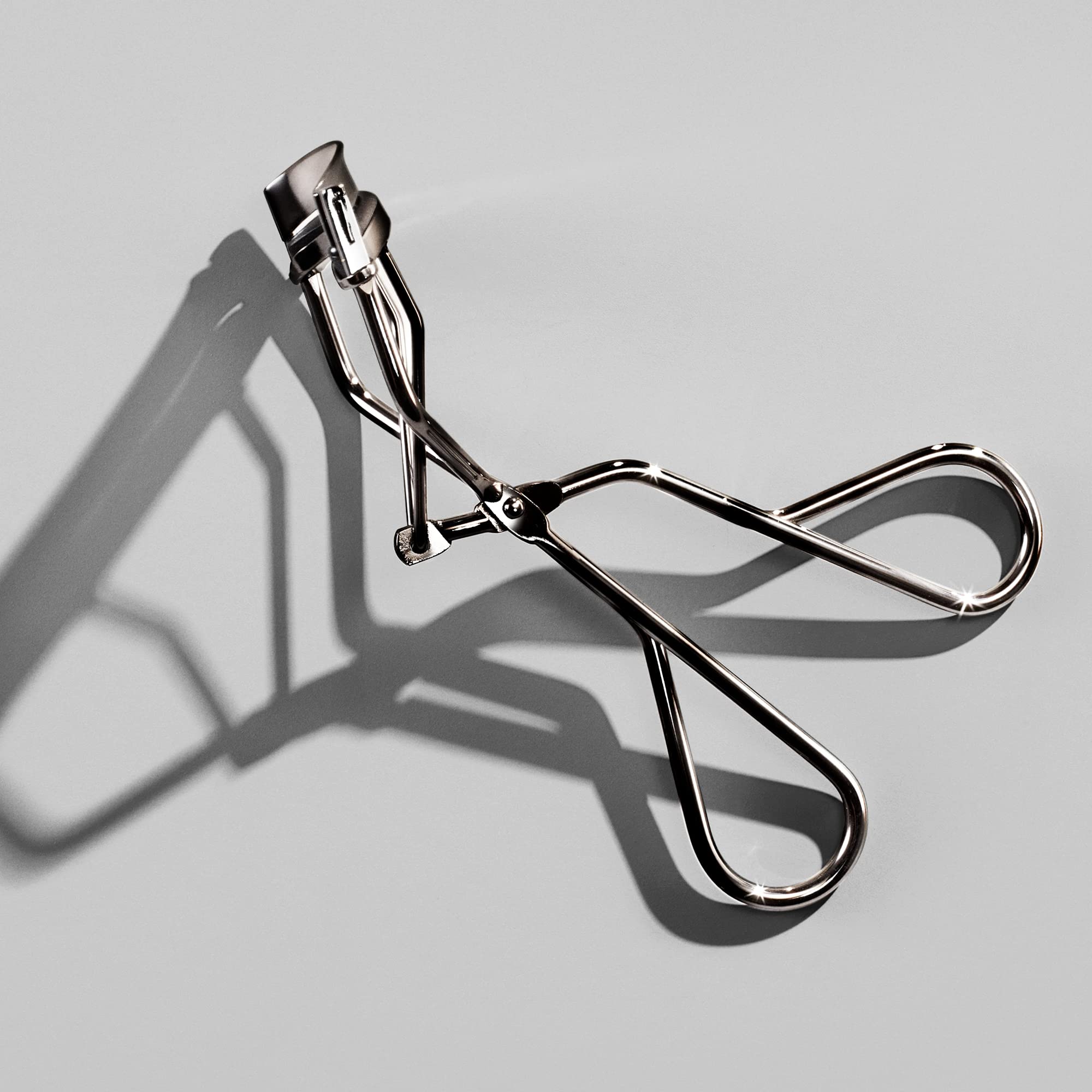 Shiseido Eyelash Curler - Crimps & Curls Lashes for Perfect, Eye-Framing Fringe - Gentle & Safe - Includes Replacement Pad Shiseido buy supplements canada